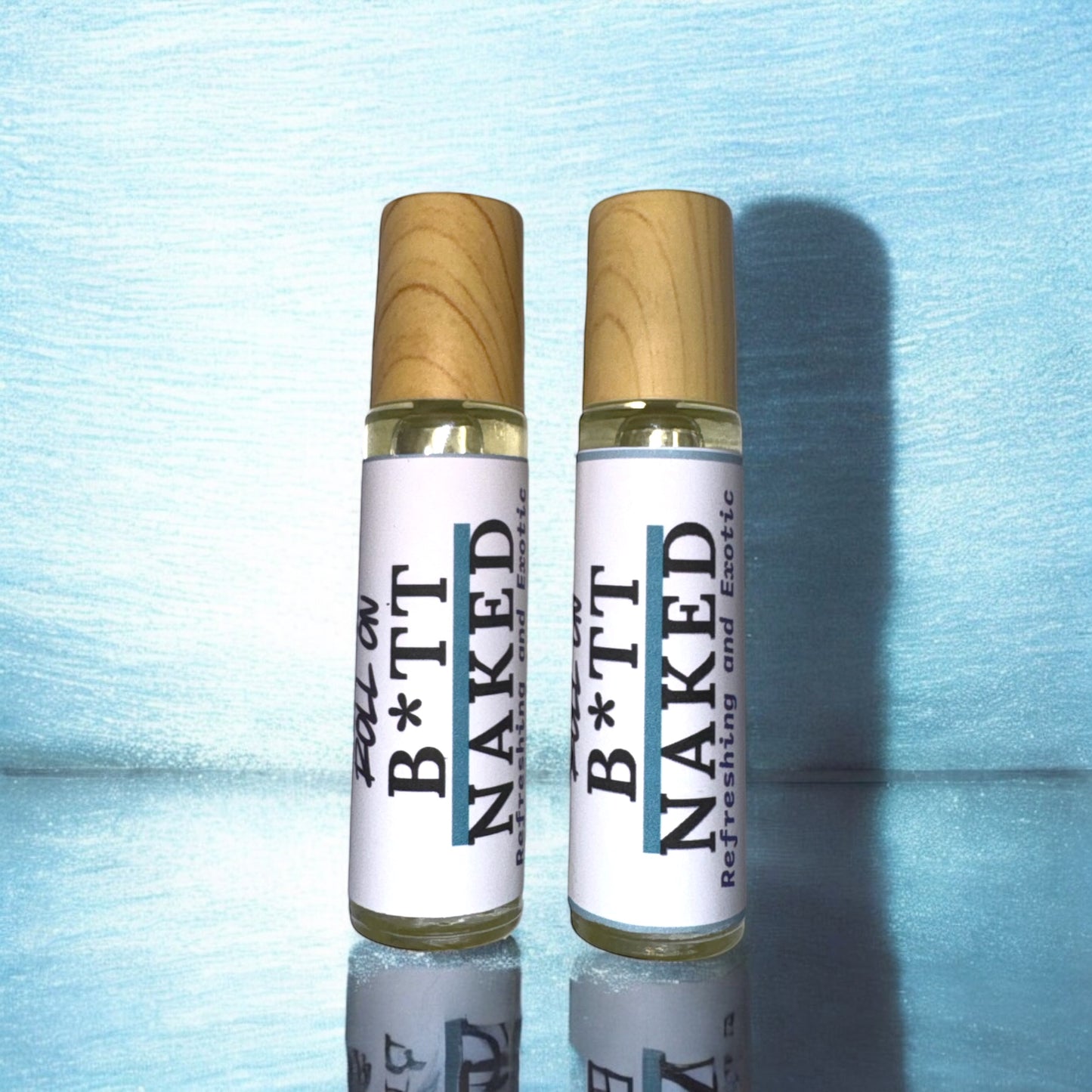 Perfume Roll On B*tt Naked Fragrance {Sweet melons, juicy pineapples, and tart apple notes dance freely among waves of cherry and florals over warm vanilla base}